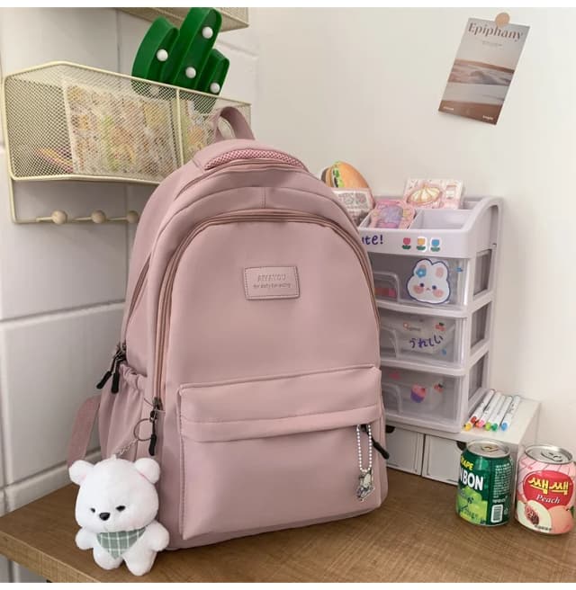 Estudante japonês mochila de grande capacidade menina simples e versátil mochila unissex material de poliéster decoração de boneca
